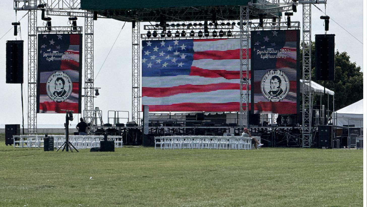 The main stage and flag screen on the monument grounds